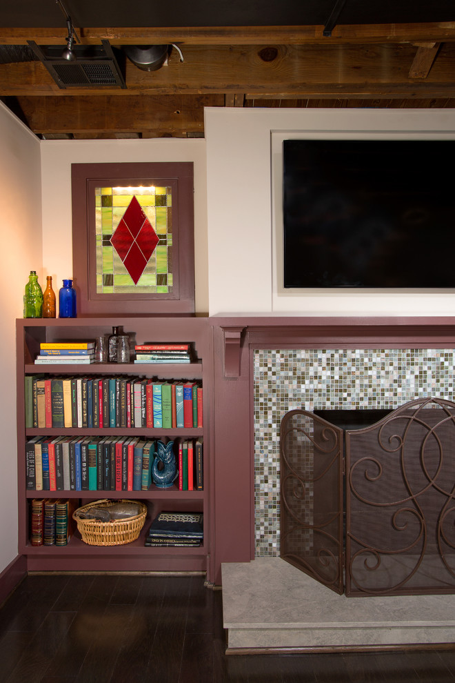 Example of a mid-sized mountain style look-out basement design in DC Metro with white walls and a standard fireplace