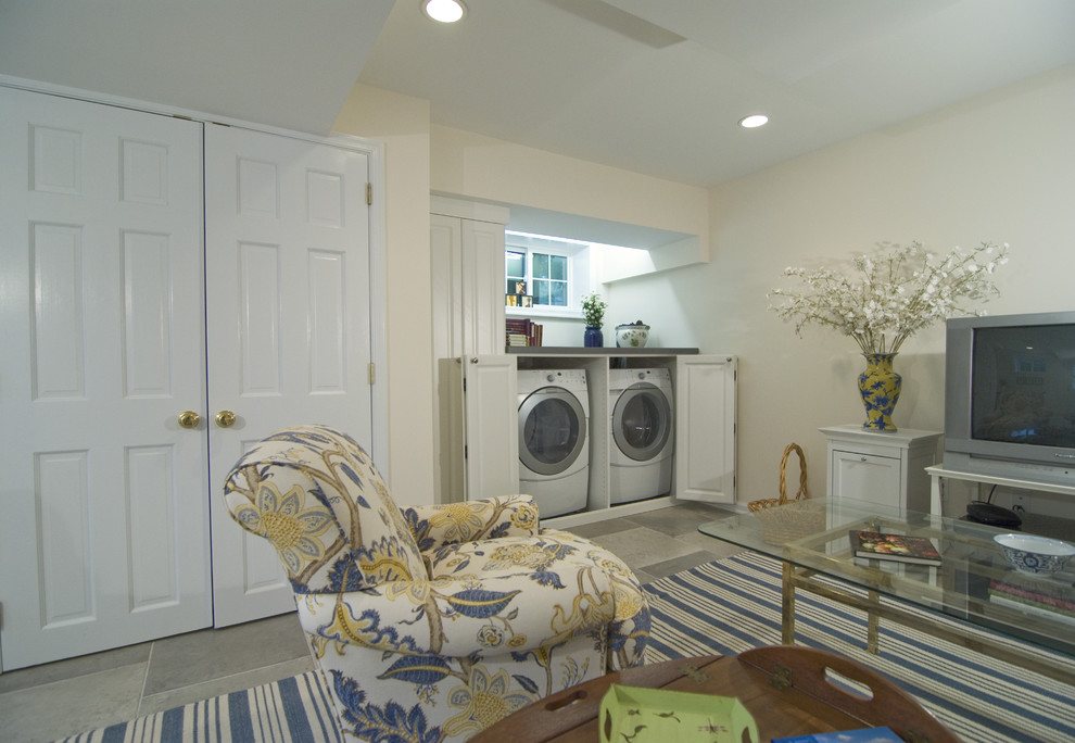 Basement - traditional look-out ceramic tile basement idea in DC Metro with white walls and no fireplace