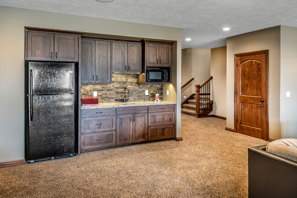 Photo of a large rustic basement in Omaha with beige walls, carpet, no fireplace and beige floors.