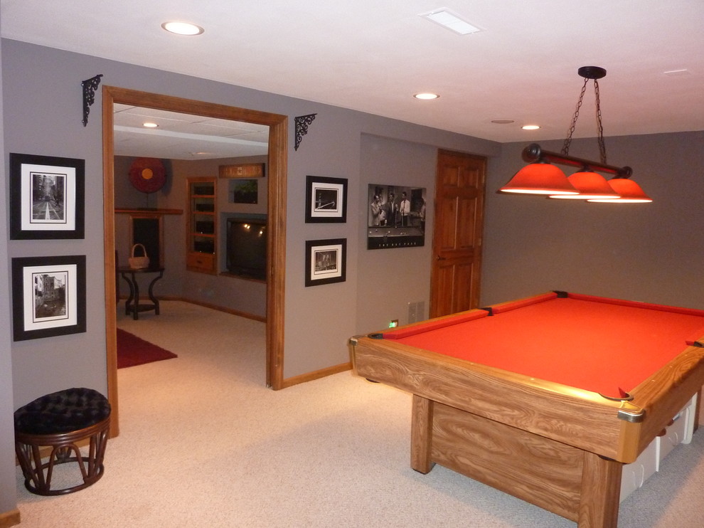 Example of a large classic carpeted basement design in Chicago with purple walls and no fireplace