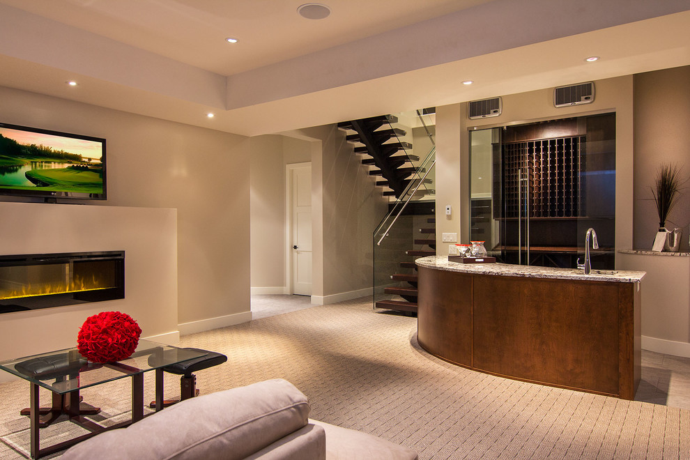Photo of a contemporary fully buried basement in Vancouver with beige walls, carpet, a ribbon fireplace and beige floors.