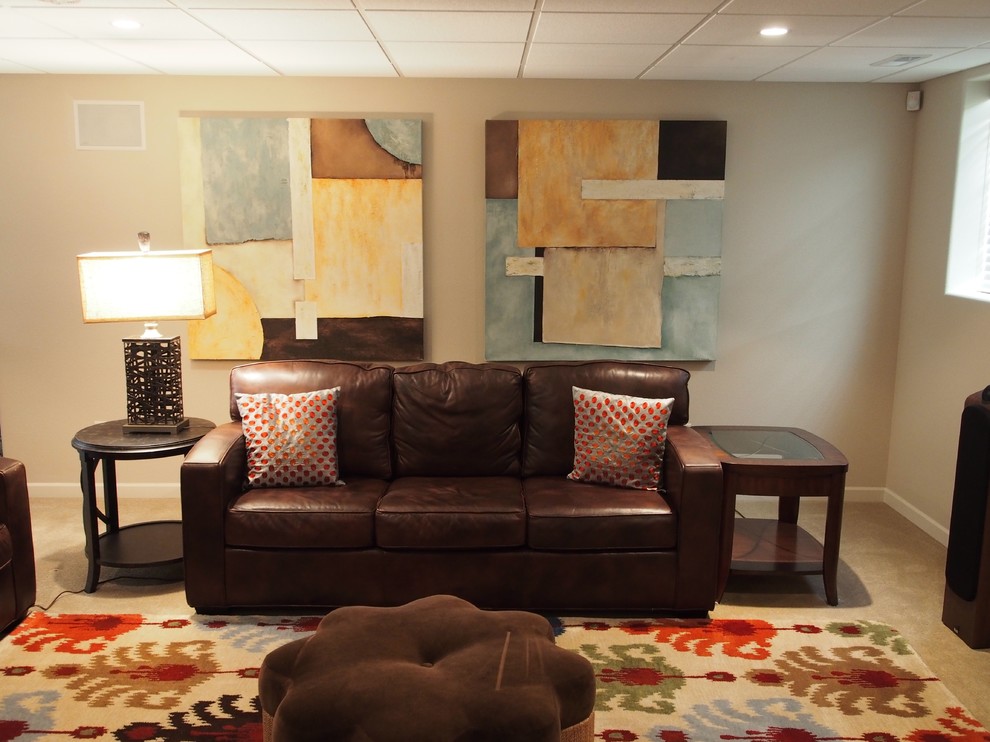 Example of a mid-sized trendy underground carpeted basement design in Other with beige walls and no fireplace