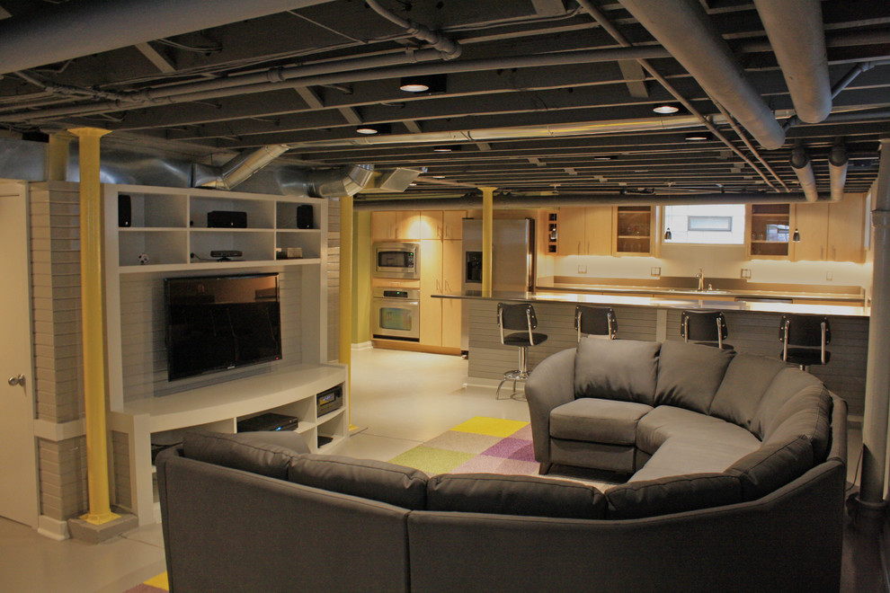 Example of a trendy gray floor basement design in Columbus