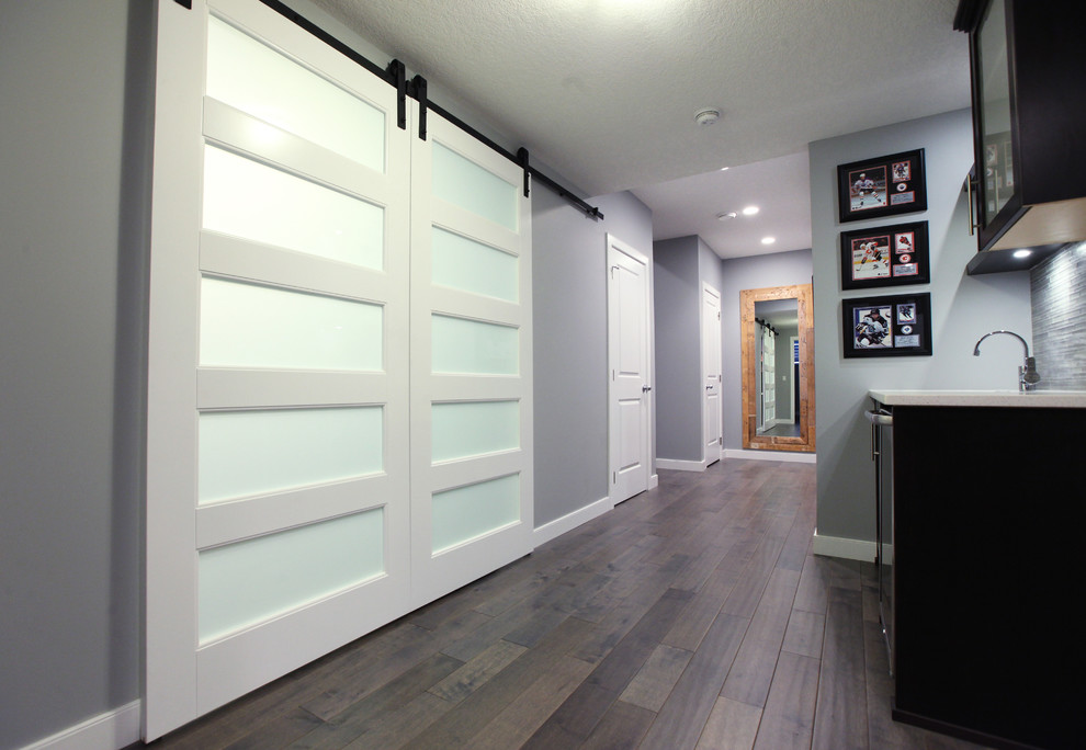 Inspiration for a contemporary basement remodel in Calgary