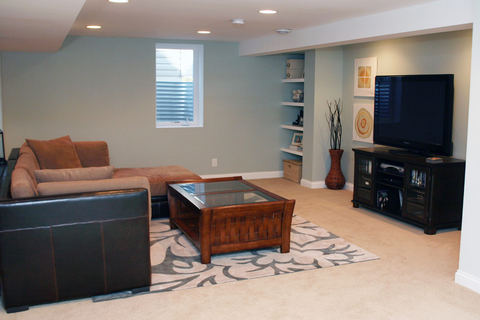Example of a large trendy look-out carpeted basement design in Minneapolis with blue walls, a standard fireplace and a tile fireplace