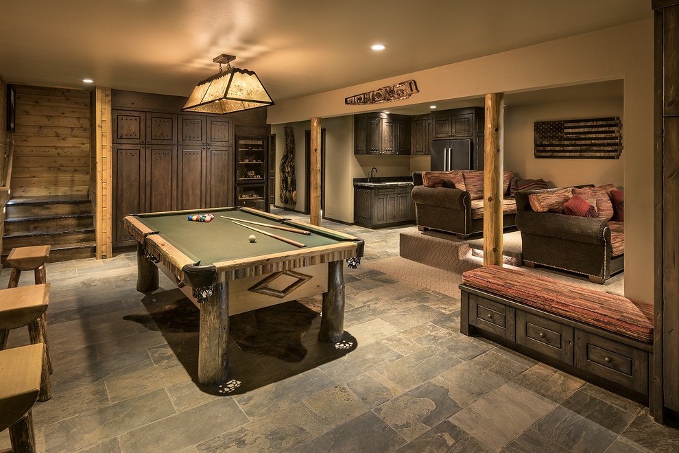 Inspiration for a mid-sized rustic walk-out slate floor and gray floor basement remodel in Phoenix
