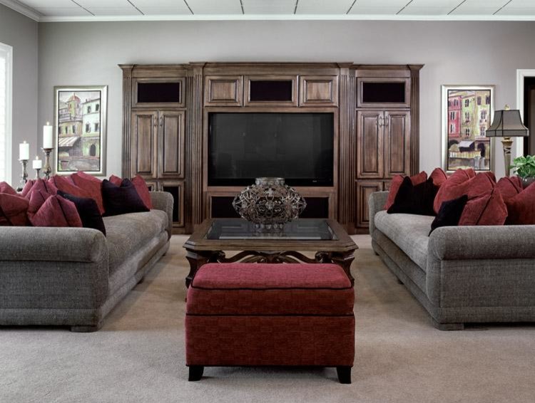 Example of a mid-sized classic walk-out carpeted basement design in Kansas City with gray walls and no fireplace