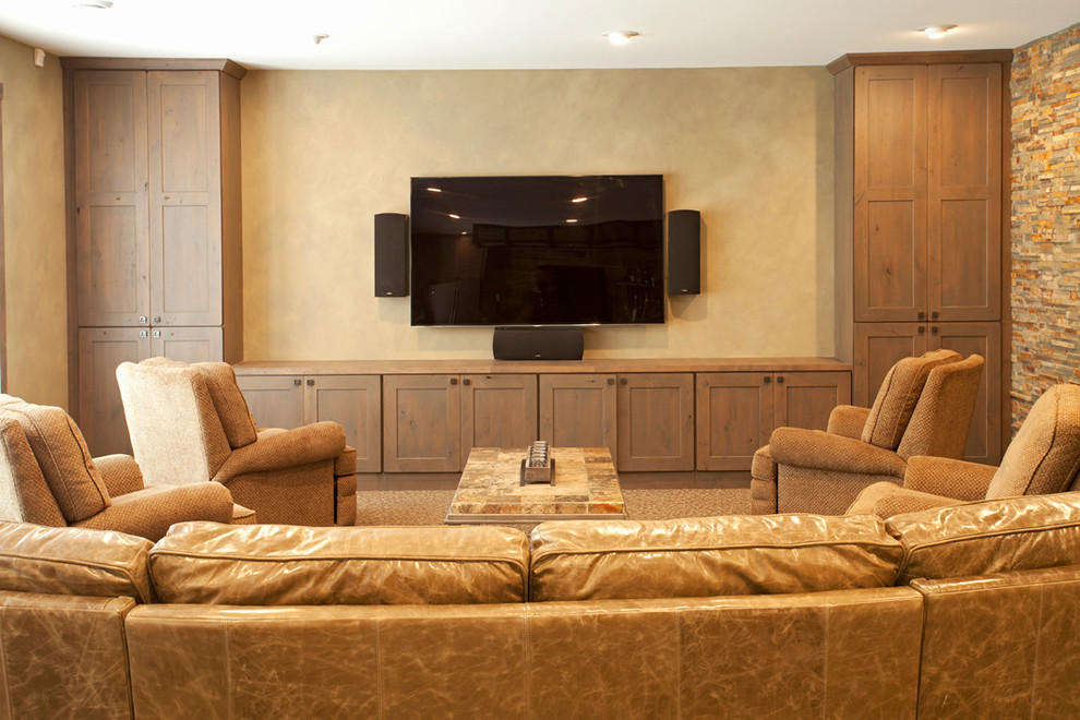Example of a huge mountain style walk-out carpeted basement design in Minneapolis with no fireplace and beige walls