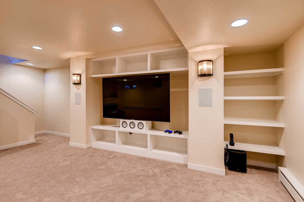 Example of a large transitional underground carpeted and beige floor basement design in Denver with beige walls and no fireplace