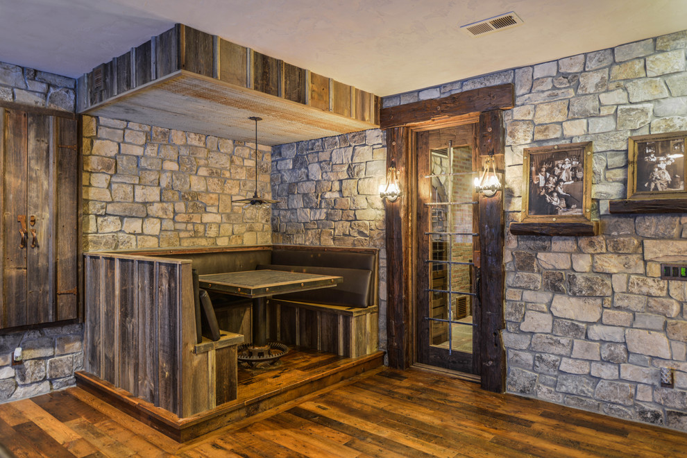 Mountain style dark wood floor dining room photo in Minneapolis with beige walls