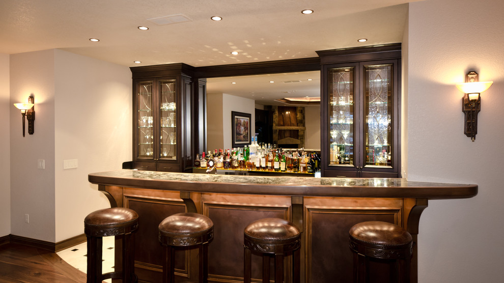 Example of a classic home bar design in Denver