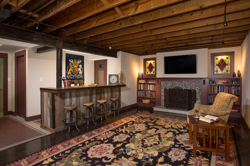 Example of a mid-sized mountain style look-out basement design in DC Metro with white walls and a standard fireplace