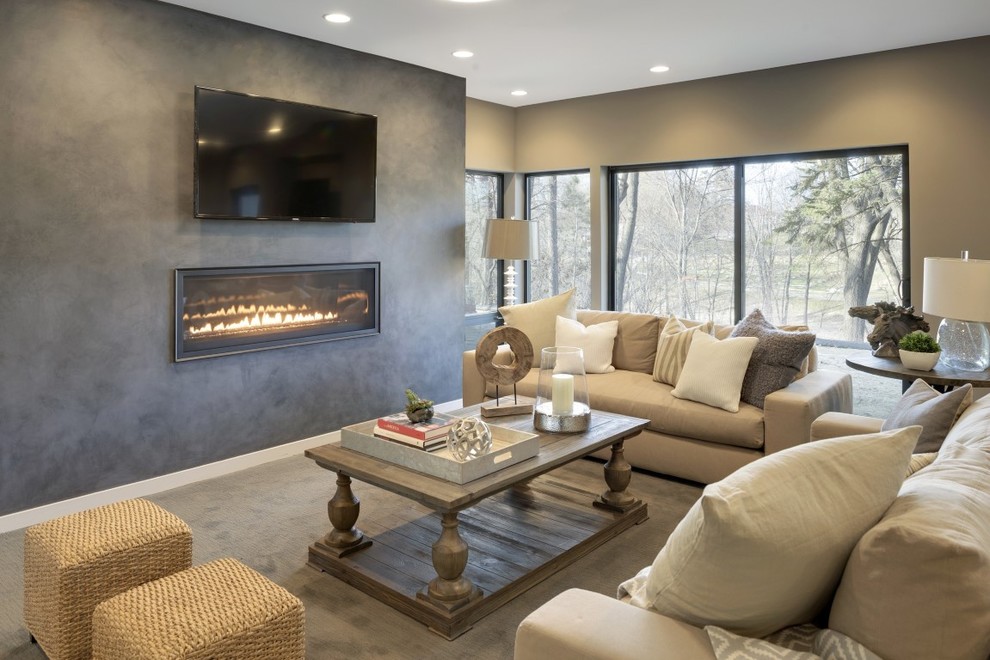 Basement - modern walk-out basement idea in Minneapolis with a standard fireplace
