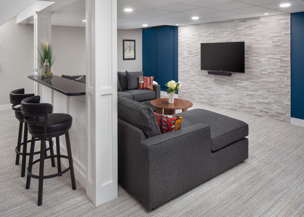 Inspiration for a mid-sized modern underground carpeted and multicolored floor basement remodel in Philadelphia with gray walls
