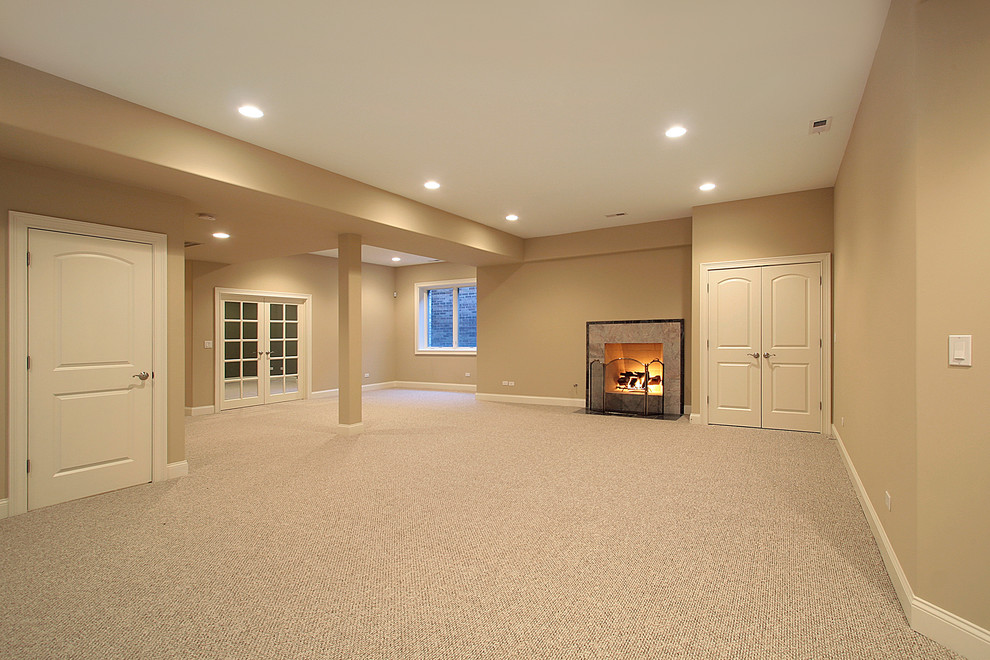 Inspiration for a modern carpeted basement remodel in Detroit with beige walls