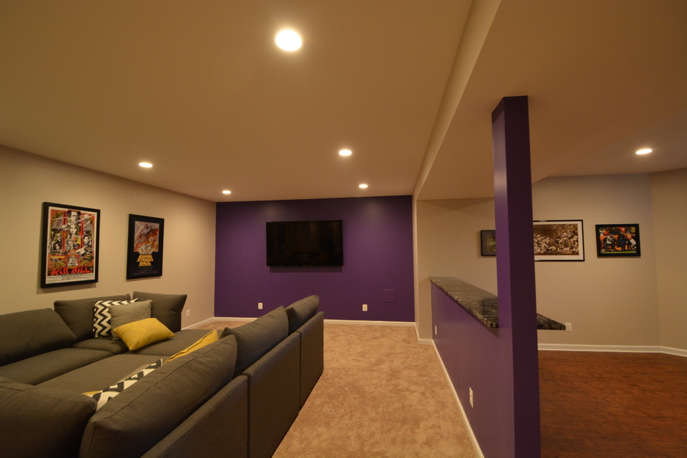 Basement - large contemporary underground dark wood floor basement idea in Baltimore with blue walls and no fireplace