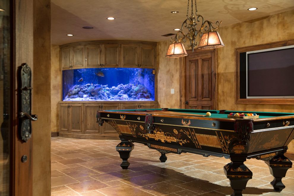 Large traditional basement in Chicago with travertine flooring.