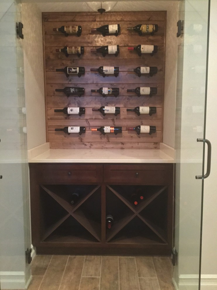 Wine cellar - transitional wine cellar idea in Detroit