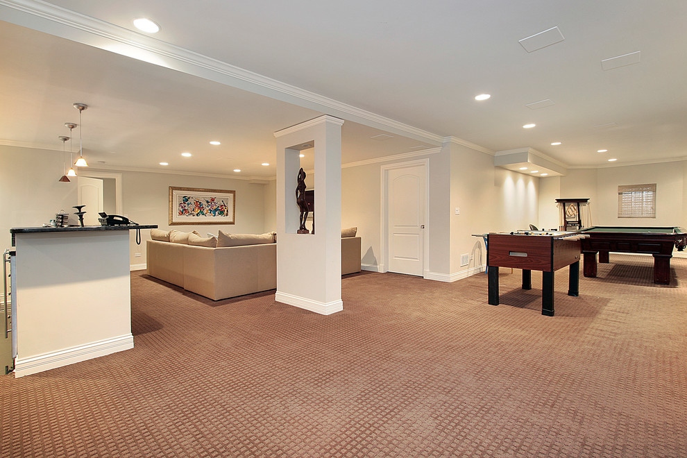 Large traditional basement in DC Metro with beige walls, medium hardwood flooring and yellow floors.