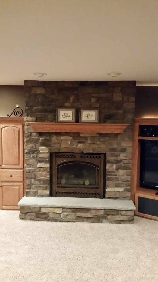Fireplaces by The Construction Coordinators Traditional Basement
