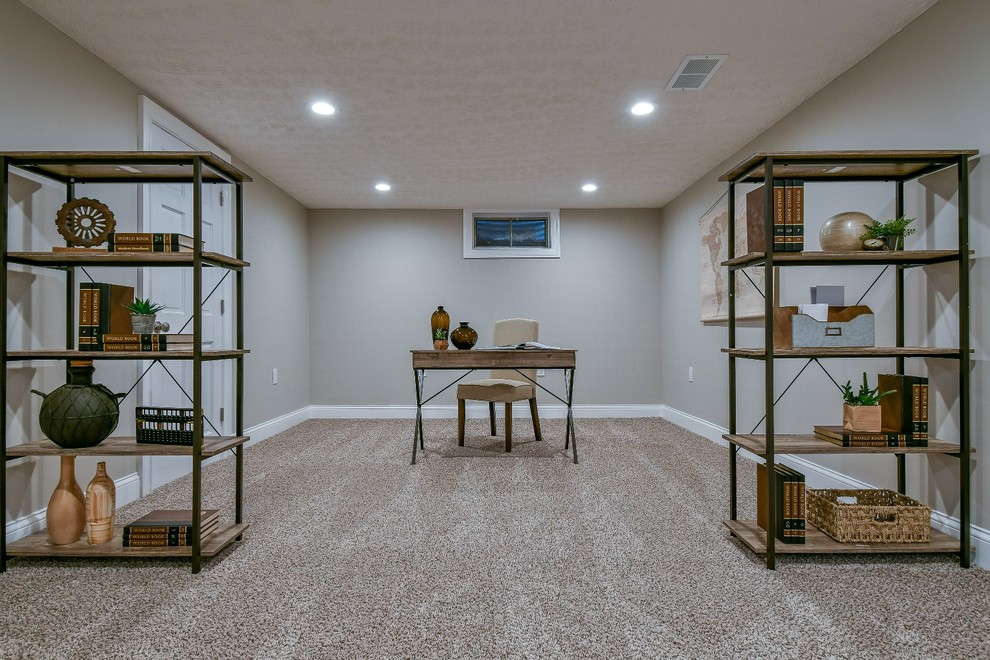 Large country underground carpeted and beige floor basement photo in Columbus with gray walls
