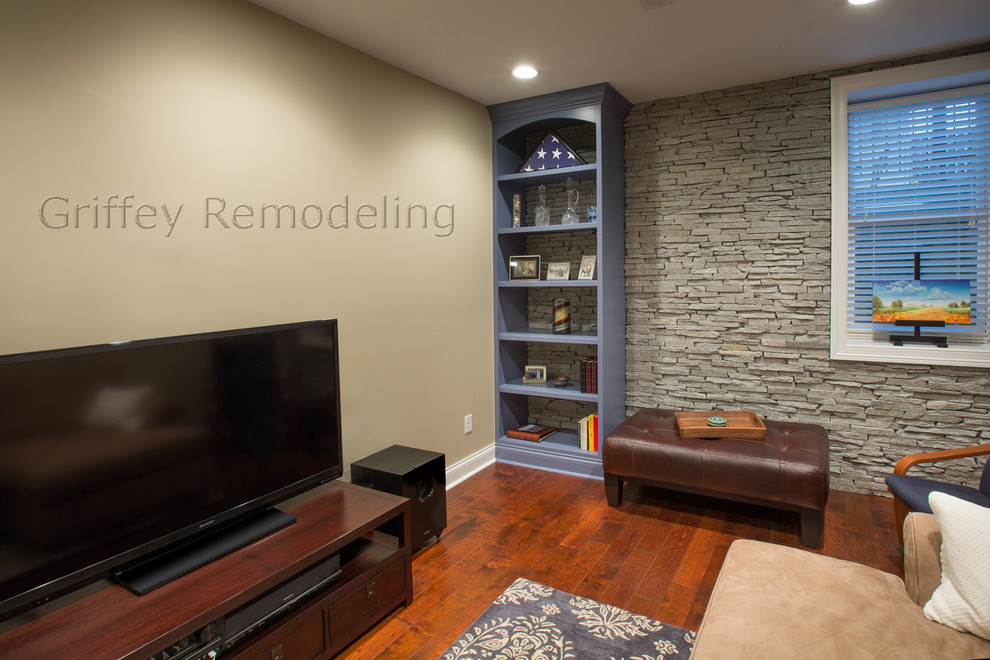 This is an example of a contemporary basement in Columbus.