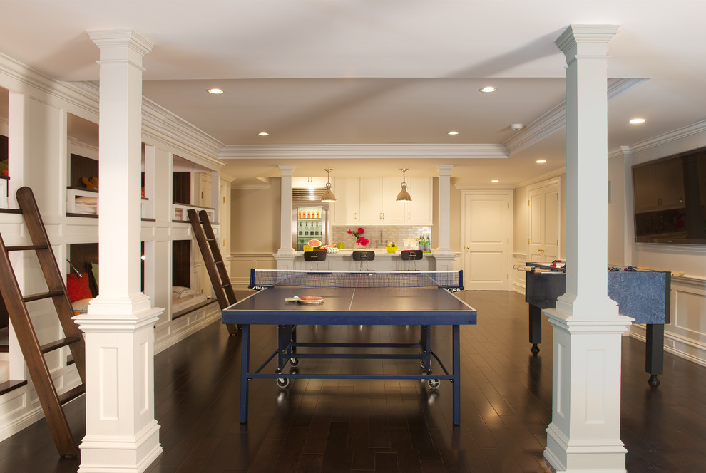 Inspiration for a large traditional walk-out basement in New York with white walls and dark hardwood flooring.