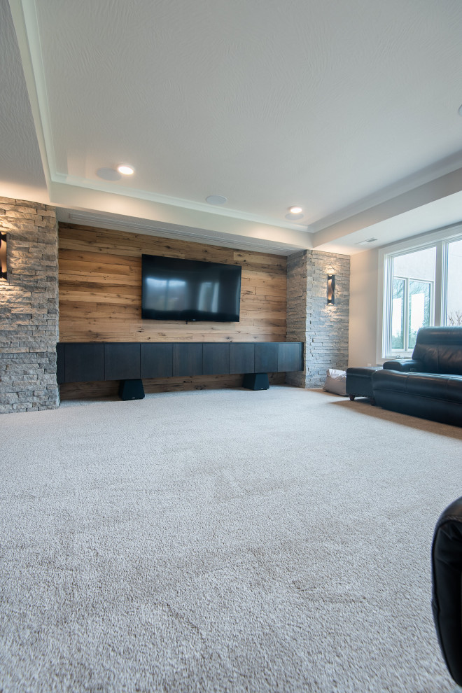 Design ideas for a large classic look-out basement in Other with grey walls, carpet and grey floors.