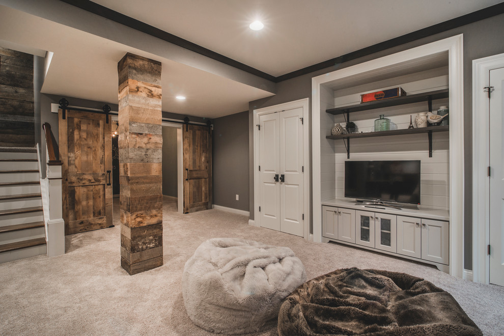 Inspiration for a large rustic basement in Columbus with grey walls and carpet.