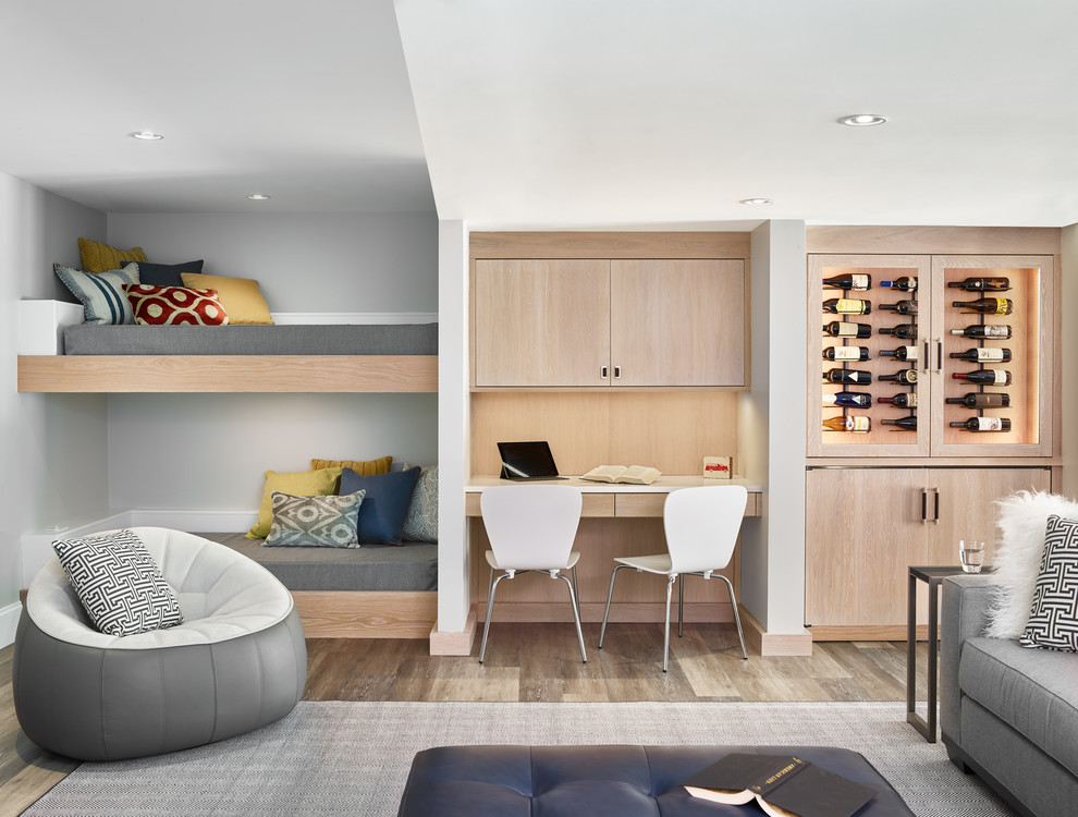 Example of a mid-sized trendy dark wood floor and brown floor basement design in Boston with gray walls