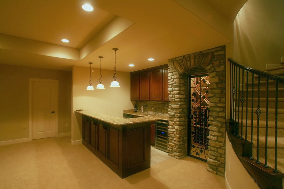 Inspiration for a mid-sized eclectic look-out carpeted basement remodel in Denver with beige walls