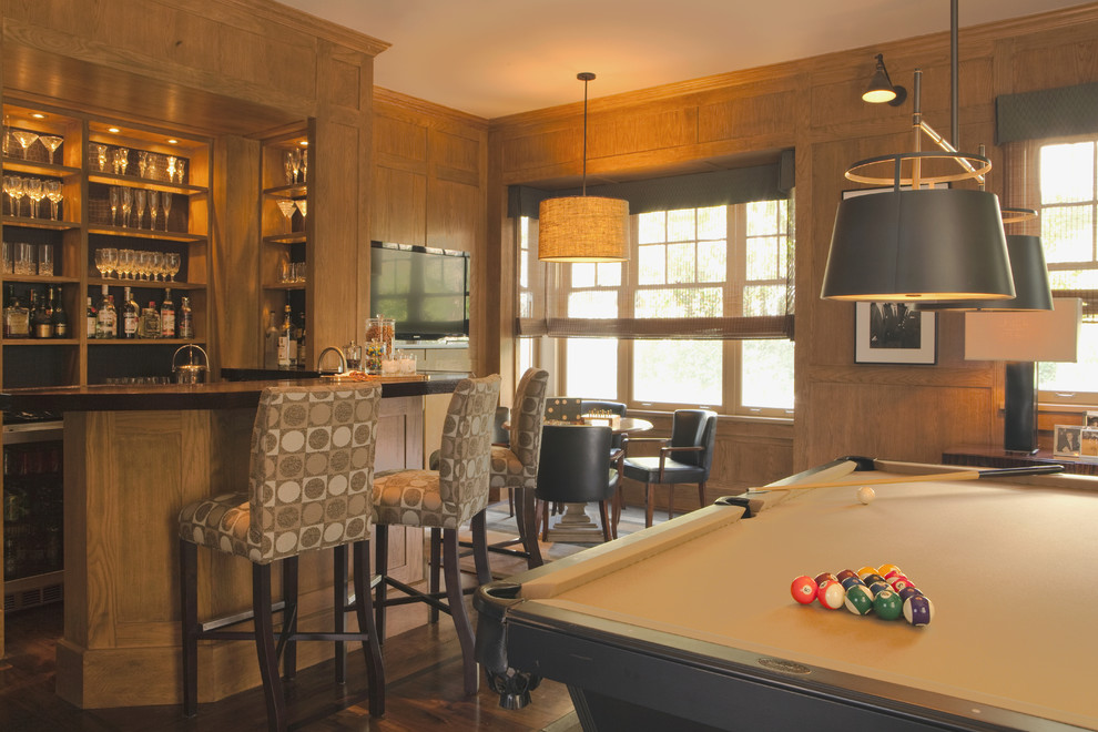 Example of a transitional look-out dark wood floor basement design in Los Angeles