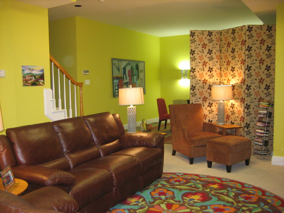 Example of a mid-sized eclectic underground carpeted and beige floor basement design in Raleigh with green walls and no fireplace