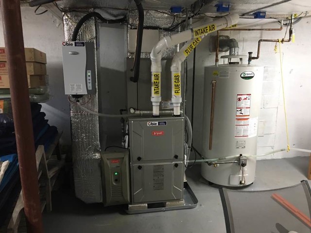 Installation of a hybrid system gas furnace with a heat pump. - Modern -  Basement - Boston - by Obie Comfort Solutions | Houzz IE