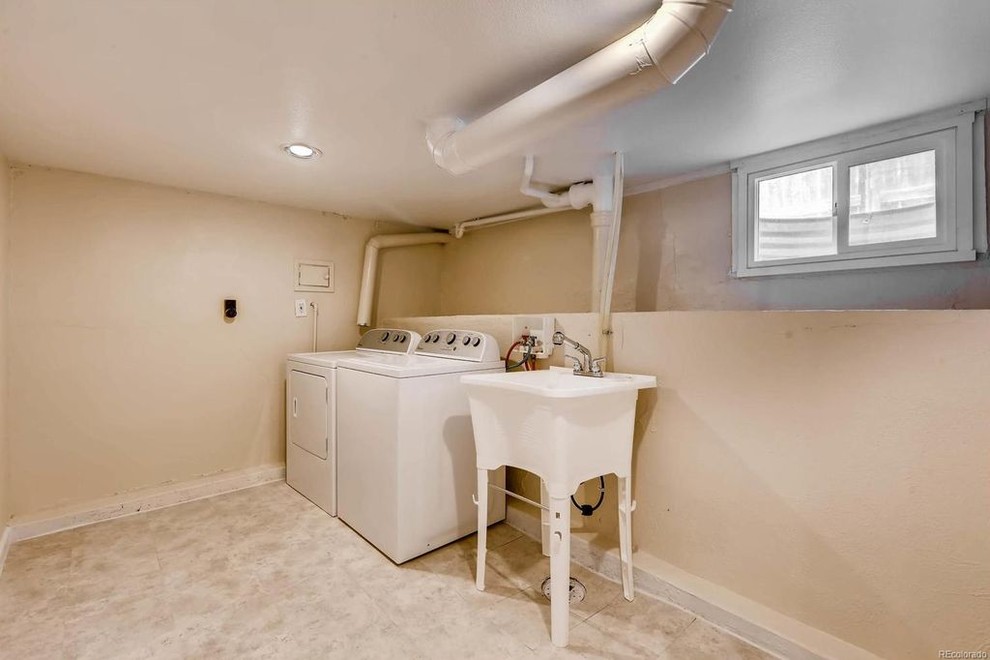 Basement - small traditional look-out carpeted and beige floor basement idea in Denver with beige walls and no fireplace