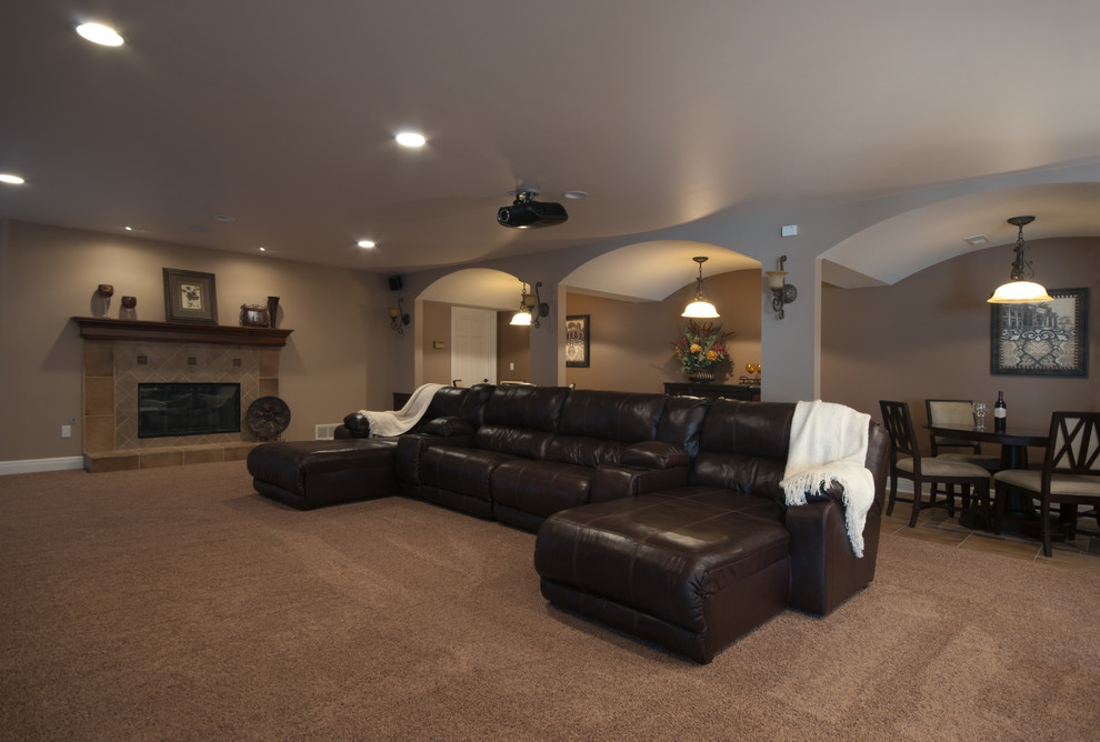 Elegant carpeted basement photo in Columbus with beige walls