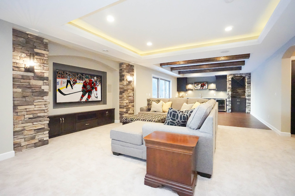 Inspiration for a mid-sized timeless walk-out carpeted and white floor basement remodel in Minneapolis with gray walls and no fireplace