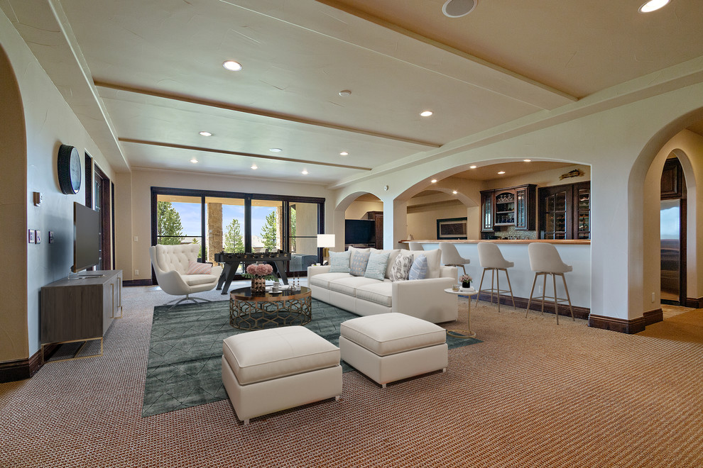 Basement - huge mediterranean walk-out carpeted and beige floor basement idea in San Diego with white walls and no fireplace