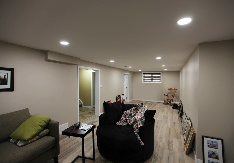Example of a mid-sized zen basement design in Edmonton