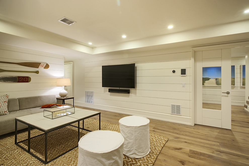 Example of a beach style basement design in Other
