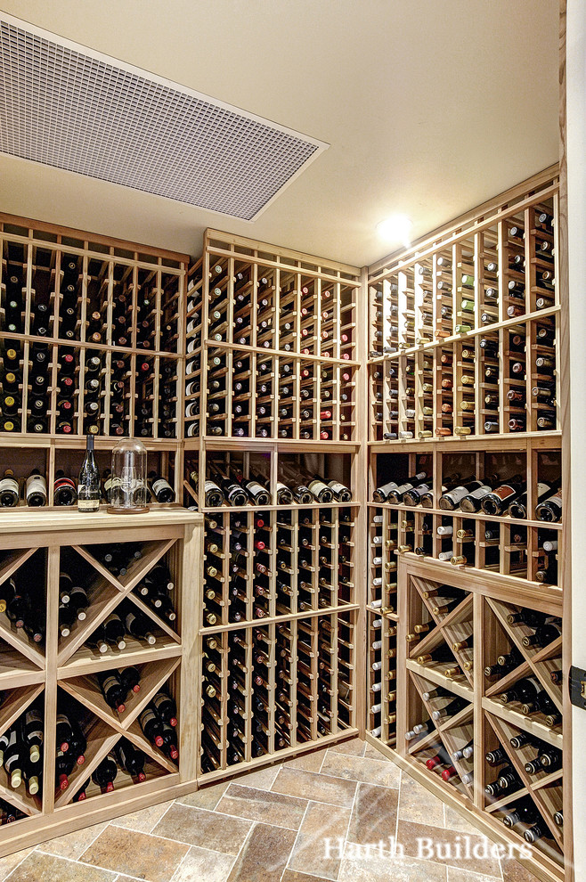 Inspiration for a medium sized traditional wine cellar in Philadelphia with ceramic flooring and brown floors.