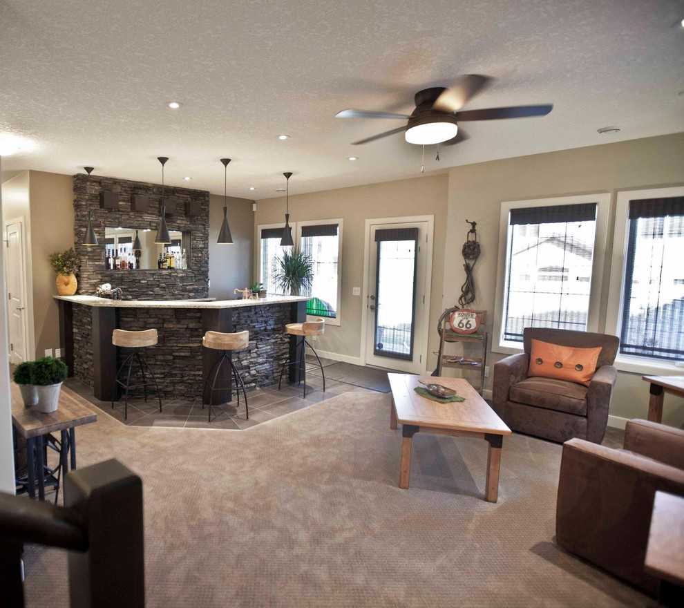 This is an example of a bohemian basement in Calgary with grey floors.