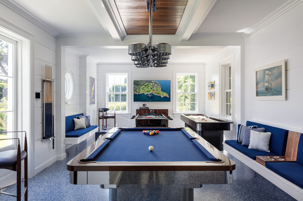 Idée de décoration pour une grande salle de séjour design avec un mur blanc et un sol bleu.