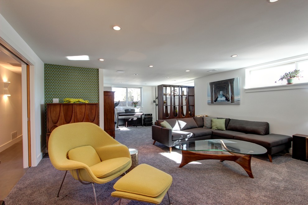 Basement - mid-sized mid-century modern look-out carpeted basement idea in Denver with white walls and no fireplace