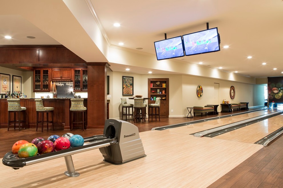 Inspiration for a classic home gym in DC Metro with beige walls and dark hardwood flooring.