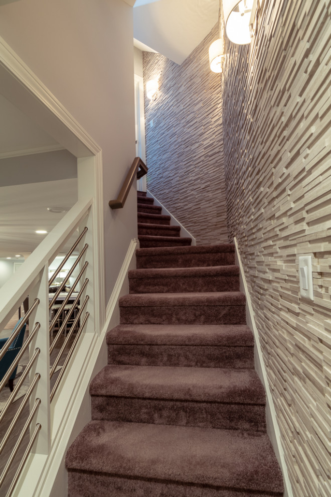 Idée de décoration pour un grand escalier tradition.