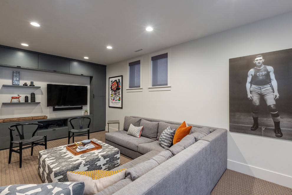 Example of a large transitional look-out carpeted basement design in Denver with no fireplace and white walls