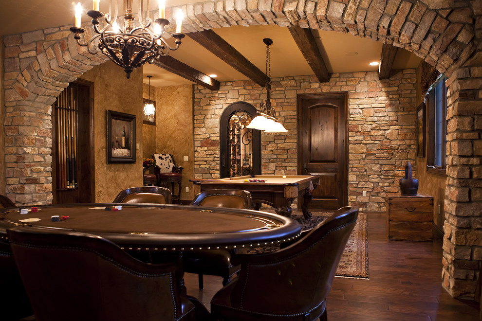 Example of a large tuscan walk-out dark wood floor and brown floor basement design in Detroit with brown walls