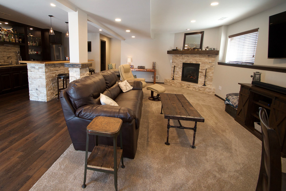 Mountain style carpeted and beige floor basement photo in Other with a corner fireplace