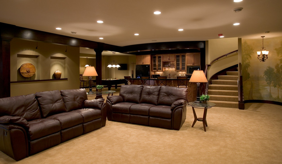 Basement - huge contemporary walk-out carpeted basement idea in Minneapolis with beige walls